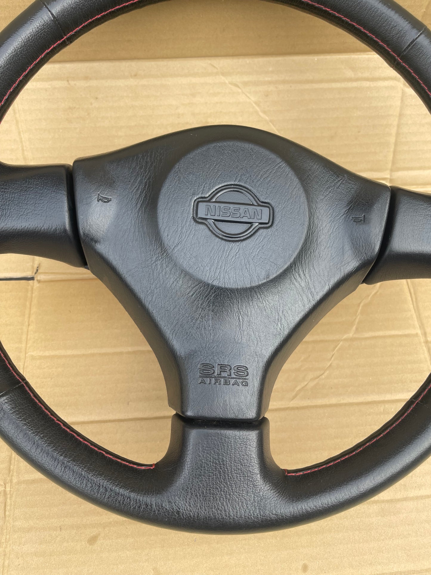 R34 RED STICH STEERING WHEEL