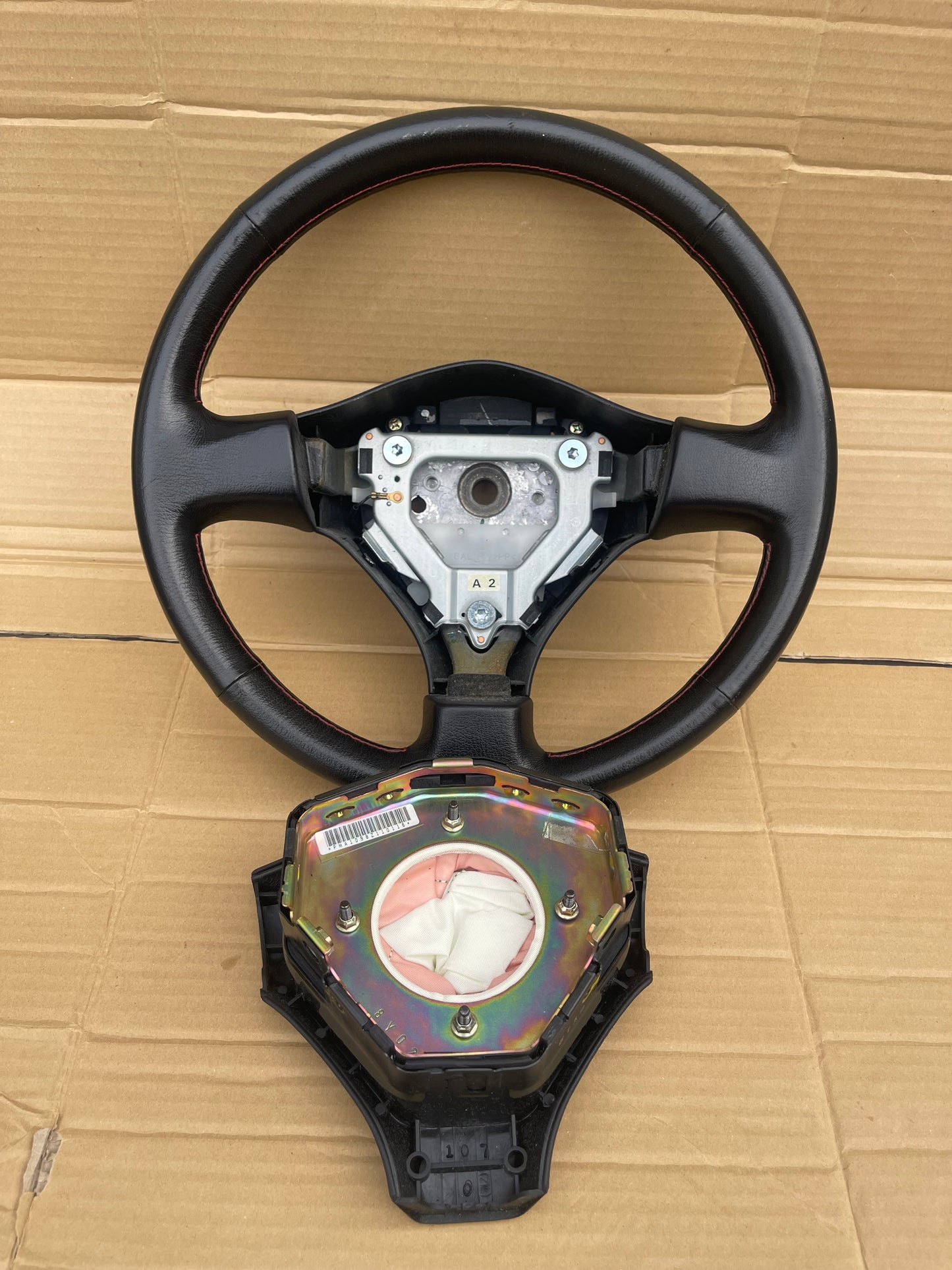 R34 RED STICH STEERING WHEEL