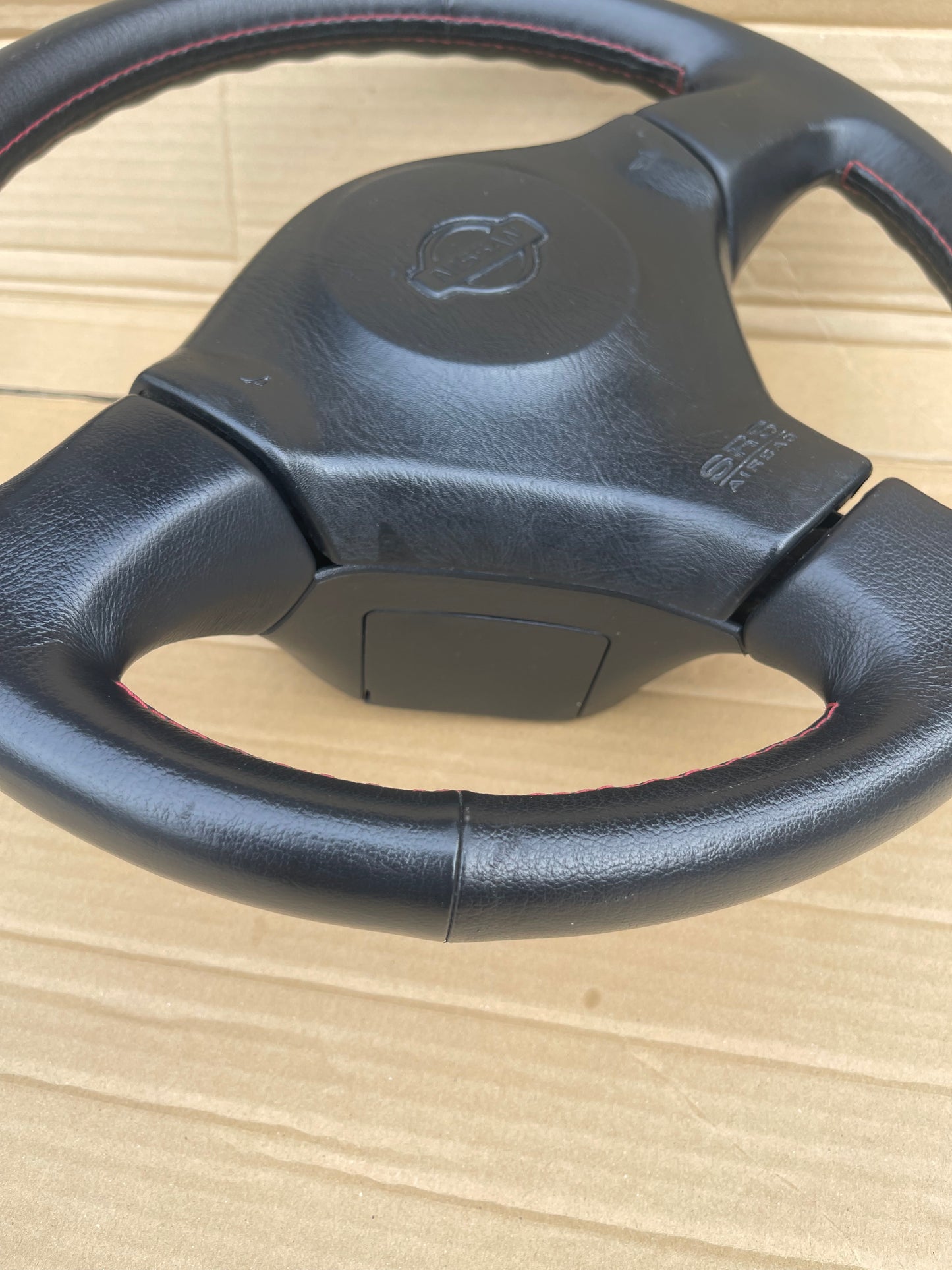 R34 RED STICH STEERING WHEEL