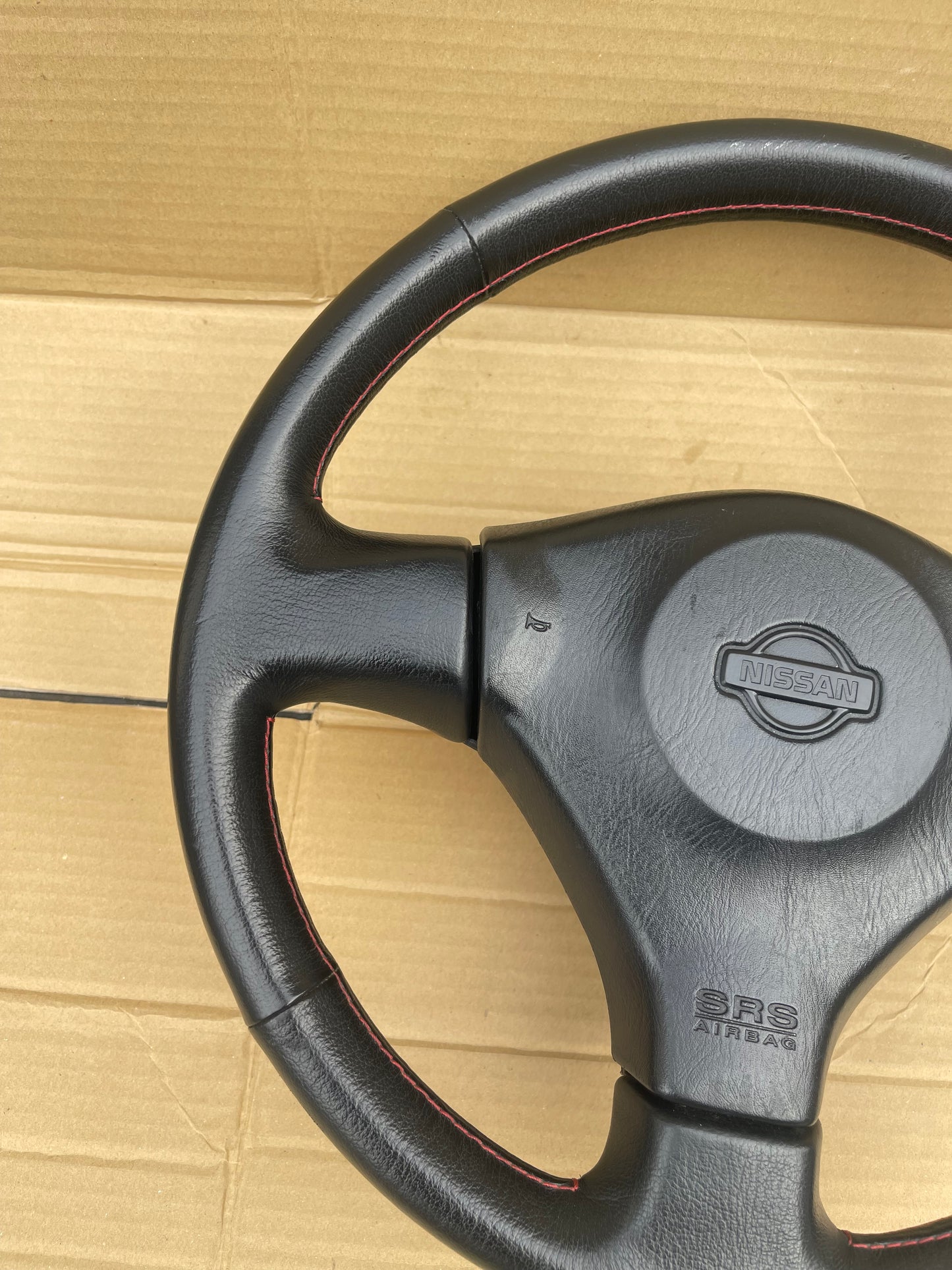 R34 RED STICH STEERING WHEEL