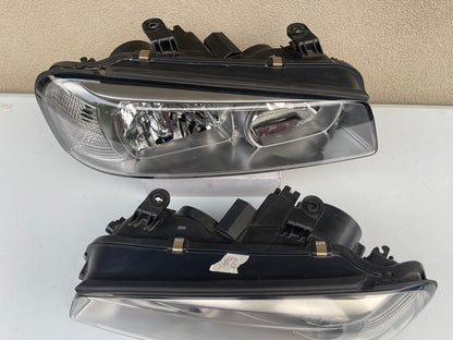 R34 NON XENON SERIES 2 HEAD LIGHT PAIR