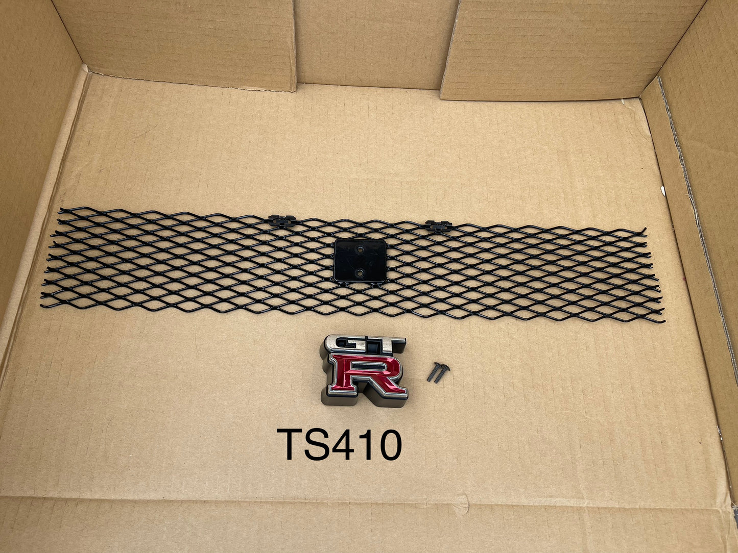 GENUINE R34 GTR BUPPER UPPER MESH AND THE GTR BADGE